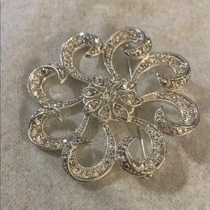 Elegant Silver Floral Brooch